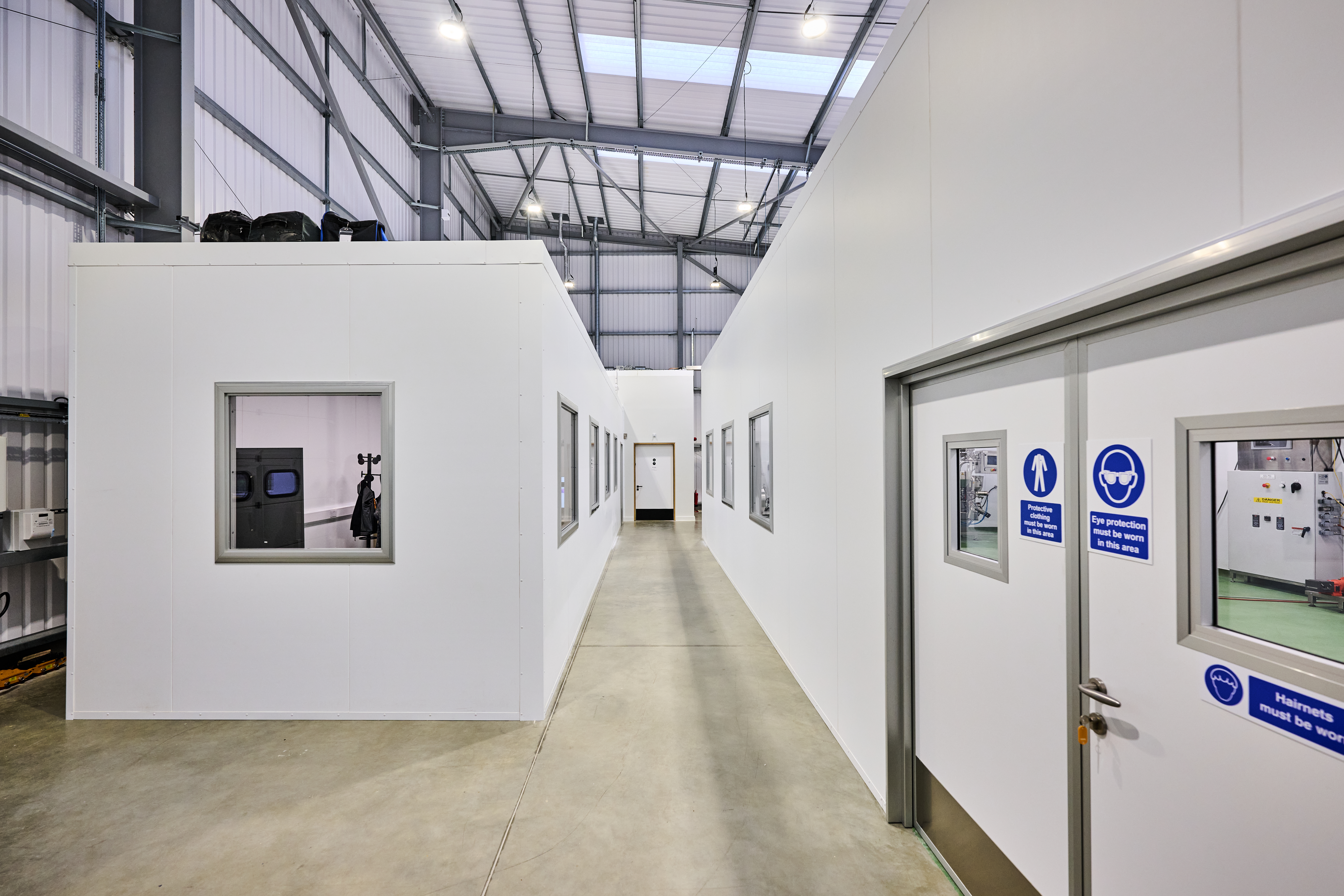 Clean room corridor with controlled environment modules